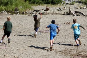 kids running through hoops