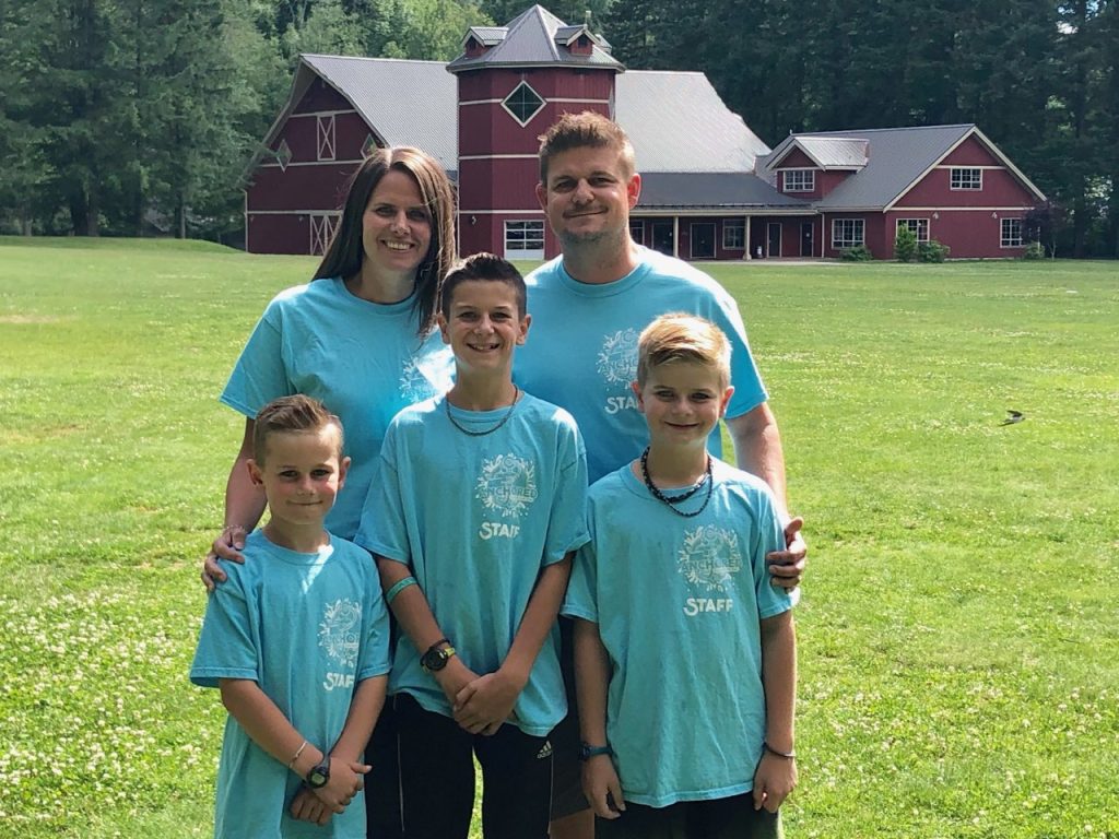 family wearing camp shirts